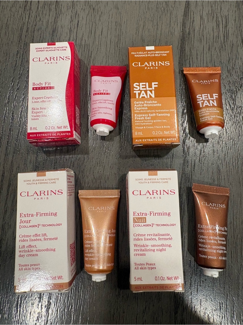 Clarins Body Fit & Self Tan Travel Set in Pink, Orange, Brown